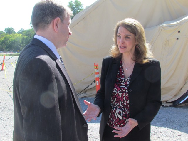 Amanda Simpson, Special Assistant To The Army Acquisition Executive, Talks With Charles Lind, Chief of Staff In The Program Executive Office For Missiles And Space