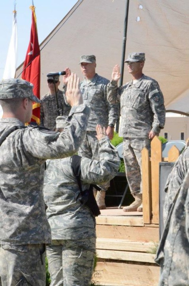 U.S. service members reenlist at Iraqi oasis