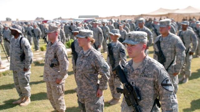 U.S. service members reenlist at Iraqi oasis