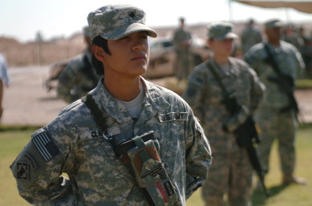 U.S. service members reenlist at Iraqi oasis