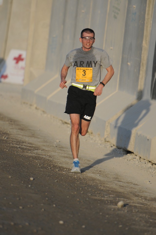 Runner competes in Army 10-Miler Shadow Run at FOB Pasab