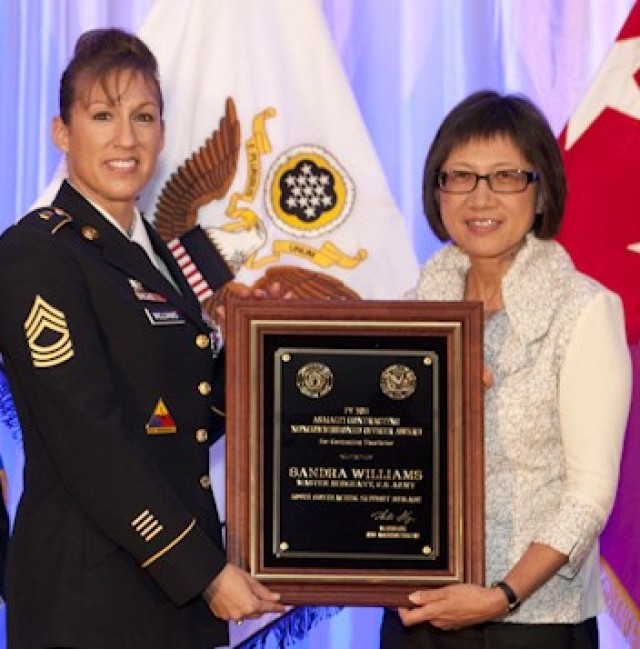 Heidi Shyu, (right) Acting Assistant Secretary of the Army for Acquisition, Logistics and Technology with Master Sgt. Sandra Williams.