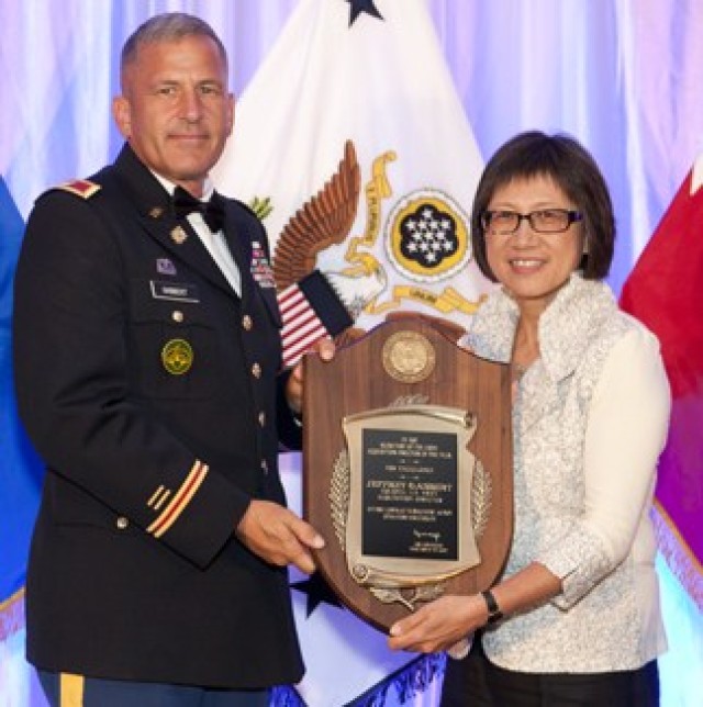 Heidi Shyu, (right) Acting Assistant Secretary of the Army for Acquisition, Logistics and Technology with Col. Jeffrey Gabbert.