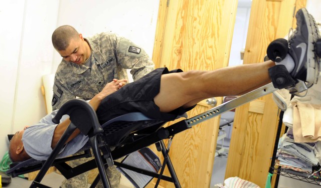 Physical therapy taking away Soldiers' pain 2 of 3