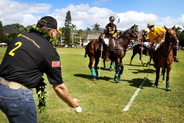 Lt. Gen. Wiercinski tosses ball to start the polo match
