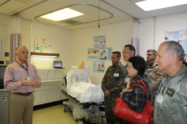 Foreign Defense Attaches tour JBLM medical training facility