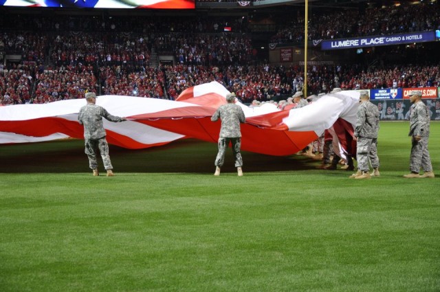 Fort Leonard Wood Soldiers unfurl colors at Game 1 of the 2011 World Series