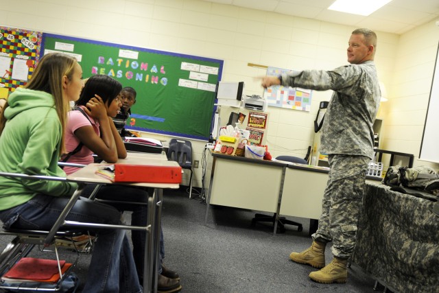 Soldiers participate in middle school career day