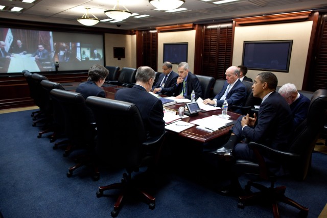 President Barack Obama talks with Prime Minister Nouri al-Maliki of Iraq