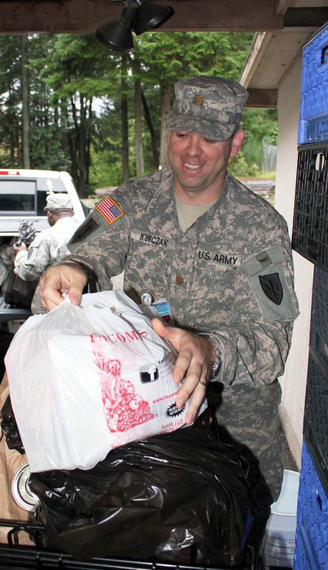 Soldiers load donations 