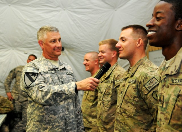 Sgt. Maj. of the Army presents coins to Arctic Wolves Soldiers