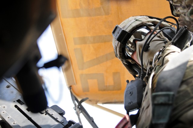 82nd Airborne Division Soldier surveys Regional Command (South) from his turret