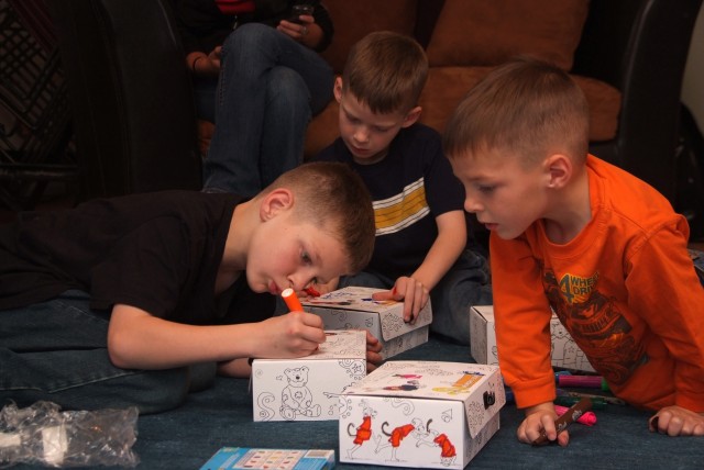 Author visits children of fallen heroes