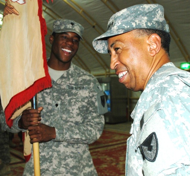 Lt. Gen. Dennis Via, deputy commanding general, Army Materiel Command welcomes Spc. Ramone Dodson to the AMC family.