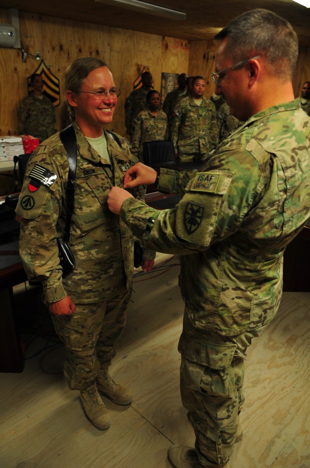 'Resolute' officer makes downrange promotion a family affair
