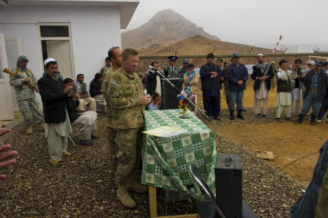 Col. Robert Akam, commander of Combined Team Uruzgan, speaks at the ceremony