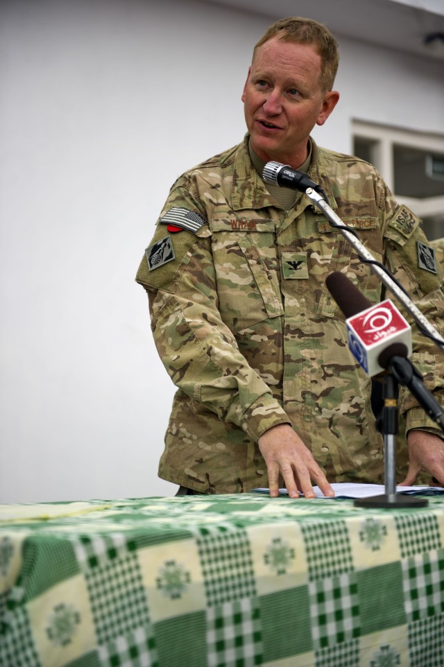 Air Force Col. Benjamin Wham, commander of USACE Afghanistan Engineer District-South speaks at the ceremony