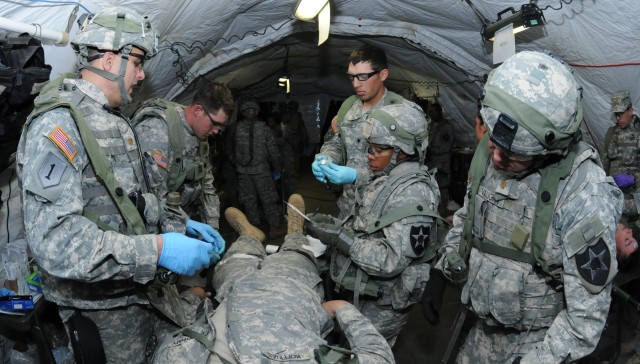 Combat aid station displays medical skills during "controlled chaos"