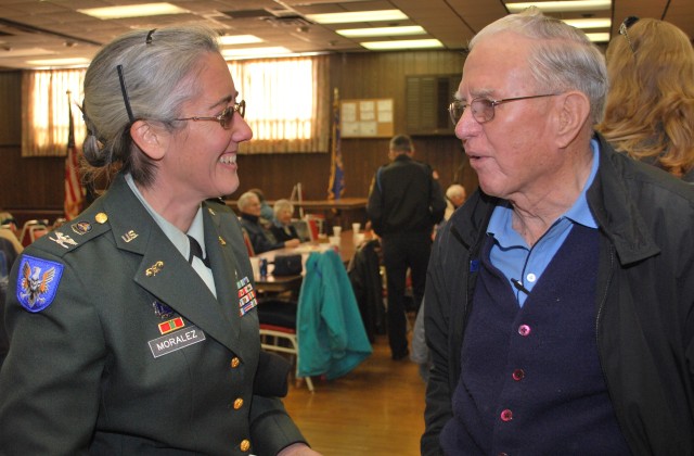 Col. Robin Moralez meets veteran at Miline Ameriacn Legion