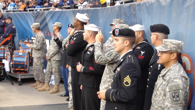 Service members get close up view of Veteran's Day game