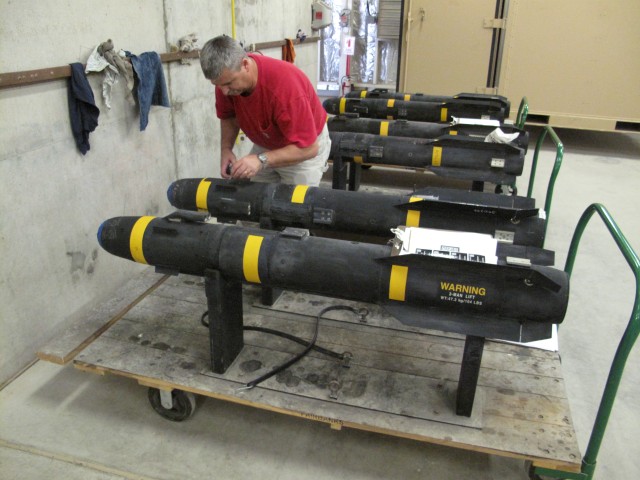 HELLFIRE missiles are processed at Forward Test and repair Facility.