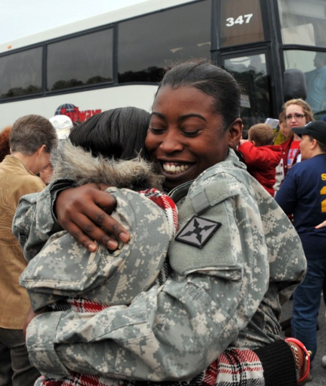 Mom hugs daughter