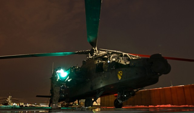 Armament technicians work long nights to keep Apache helicopters in the fight