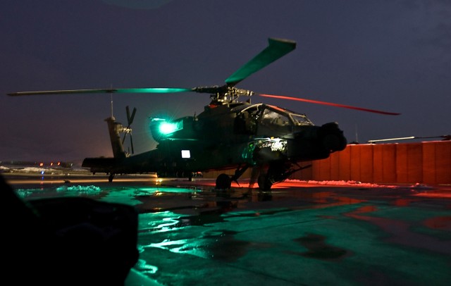Armament technicians work long nights to keep Apache helicopters in the fight