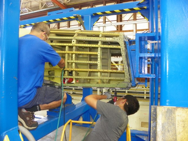 CCAD Artisans work to complete repairs on an MH-60L