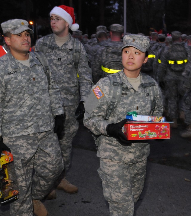 Soldiers donate to Santa's Castle effort
