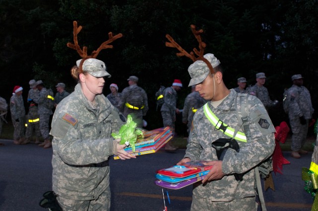 Soldiers donate to Santa's Castle effort