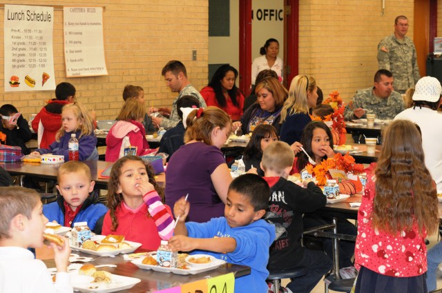 Soldiers serve Thanksgiving dinner to parents, students at Bliss Elementary