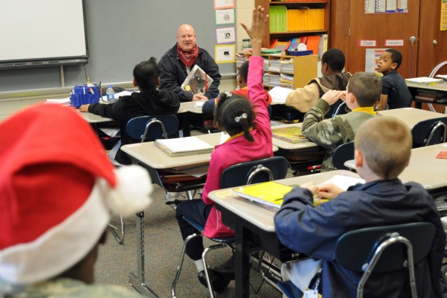 'Maintainers' deliver gift of the written word to Liberty Elementary students