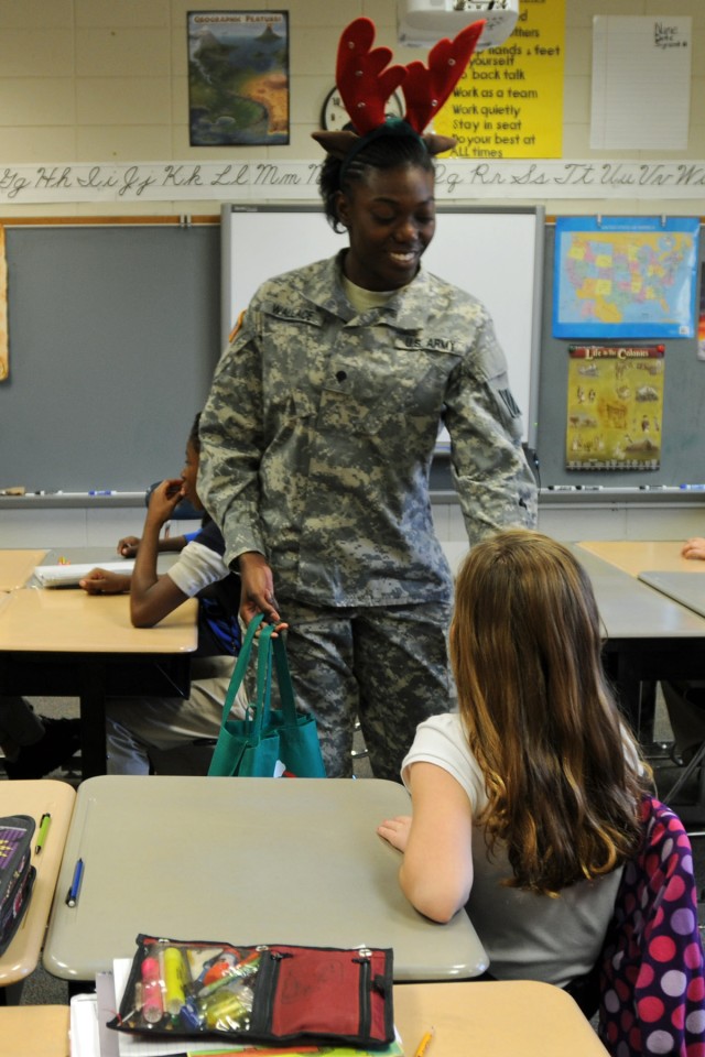 'Maintainers' deliver gift of the written word to Liberty Elementary students