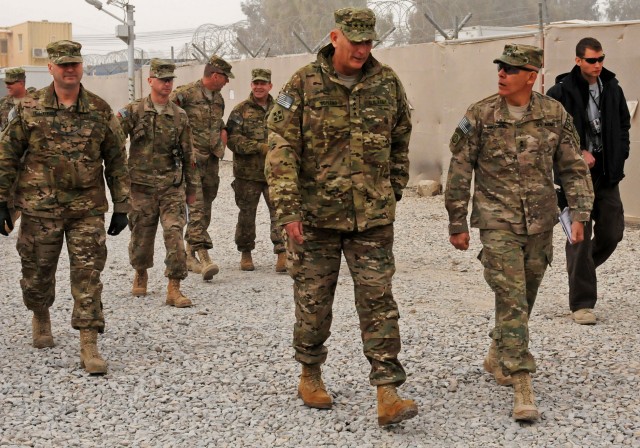 Army Chief of Staff Ge. Raymond Odierno walks with RC(S) commander Maj. Gen. Jim Huggins