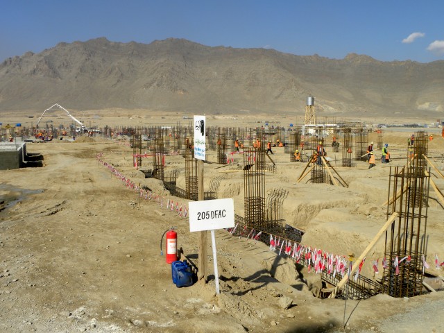 Contractors build two Afghanistan National Army Schools side-by-side.
