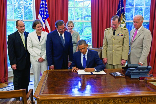 President Obama signs DADT repeal