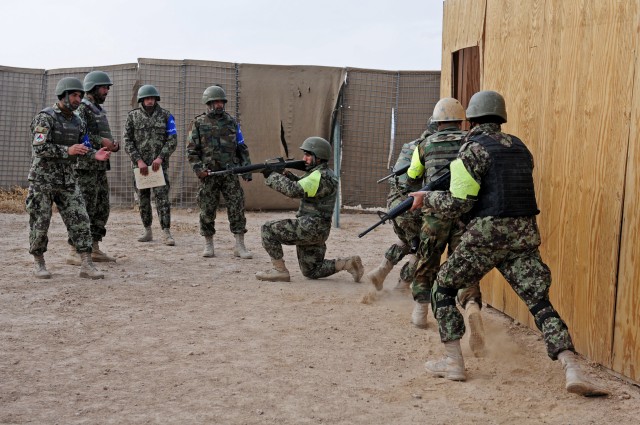 Afghan National Army NCOs demonstrate room-clearing techniques in Zabul 