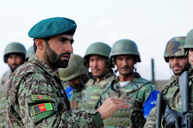 Afghan National Army 205th Corps Command Sgt. Maj. Kafayatullah speaks with soldiers in Zabul
