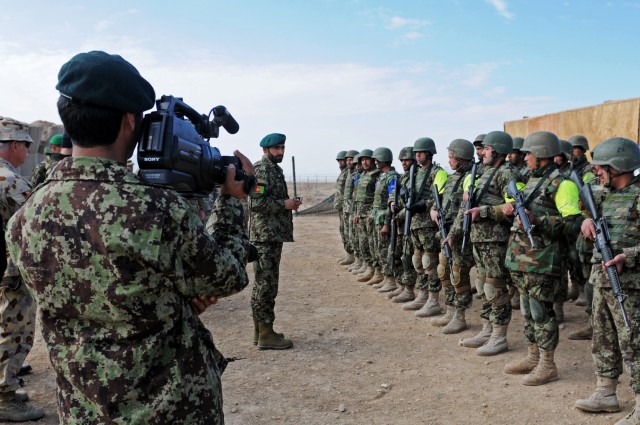 Afghan National Army public affairs soldier covers the 205th Corps Command Sgt. Maj. Kafayatullah visit in Zabul