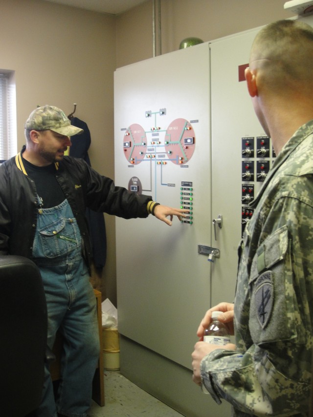 Jeff Shook, Asst. Director for Pleasant Hill (Mo.) Sewer District, Explains the Water Treatment System to Civil Affairs Soldiers Conducing an Assessment