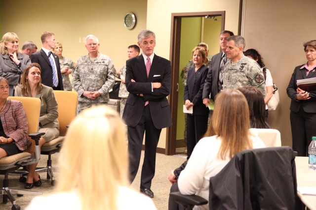 Secretary of the Army John McHugh speaks with students