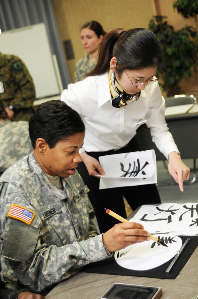 Yama Saukra 61 Soldier learns calligraphy 
