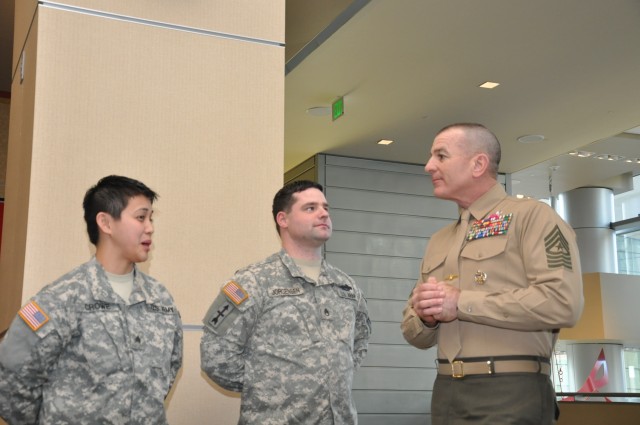 Soldiers talk to Marine Sgt. Maj. Bryan Battaglia, the Senior Enlisted Advisor to the Joint Chiefs of Staff.