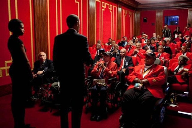 Barack and Michelle Obama host Tuskegee Airmen at a showing of the movie