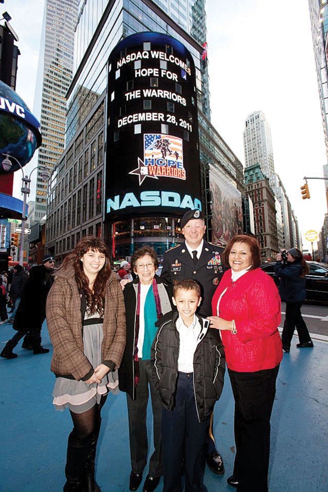 Fort Riley wounded warrior closes NASDAQ in New York