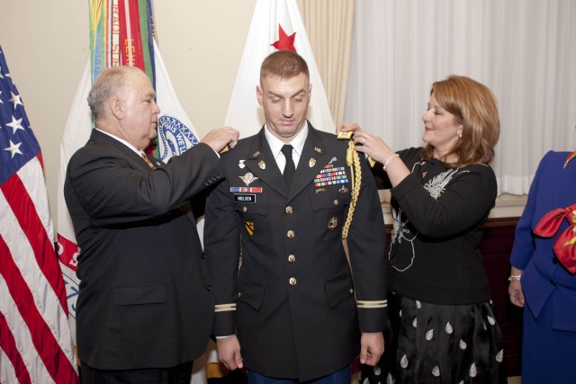 Under SecArmy promotes aide-de-camp to Lt. Col. 