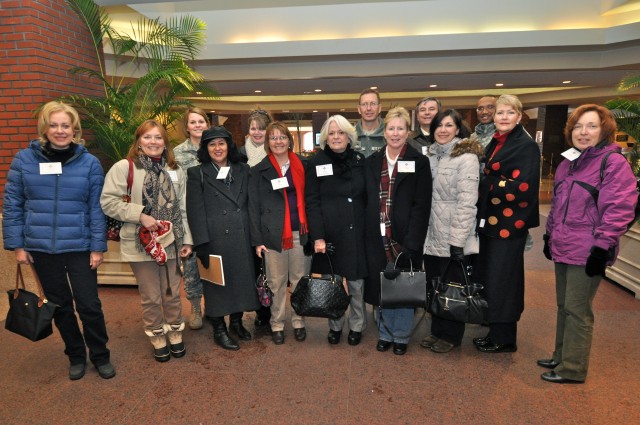 Honored guests observe stork's nest renovations