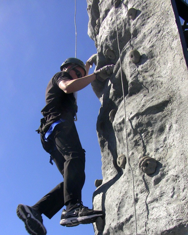 Future service member climbs rock wall