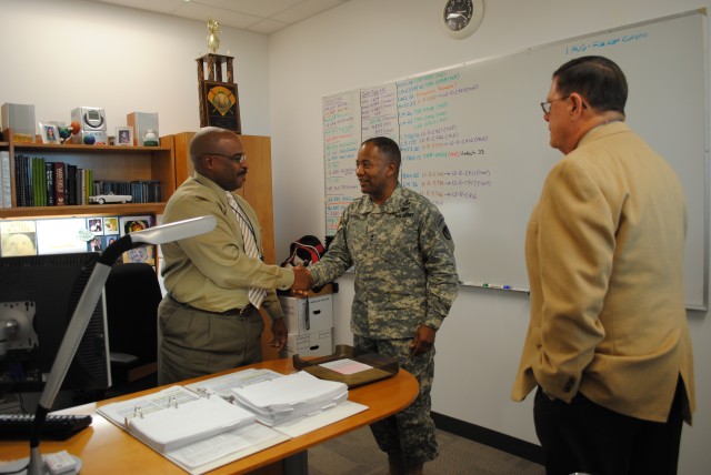 CECOM Commander greets Software Engineering Center personnel